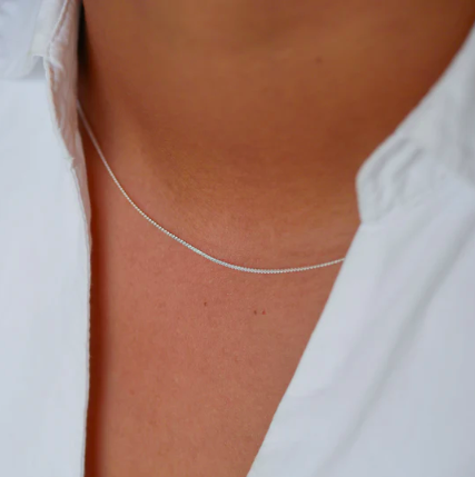 enamel-copenhagen-naomi-necklace-silver-stick-and-ribbon-nottingham